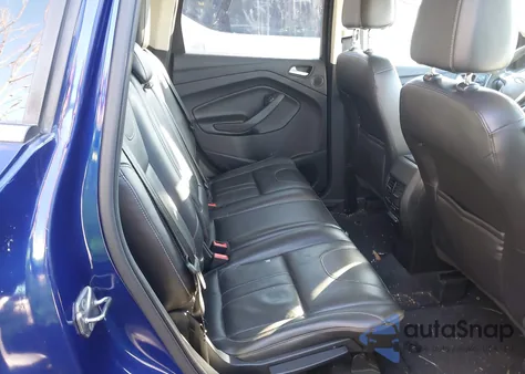 2013 Ford Escape Titanium z USA, uszkodzony, nr VIN 1FMCU0J92DUC41289